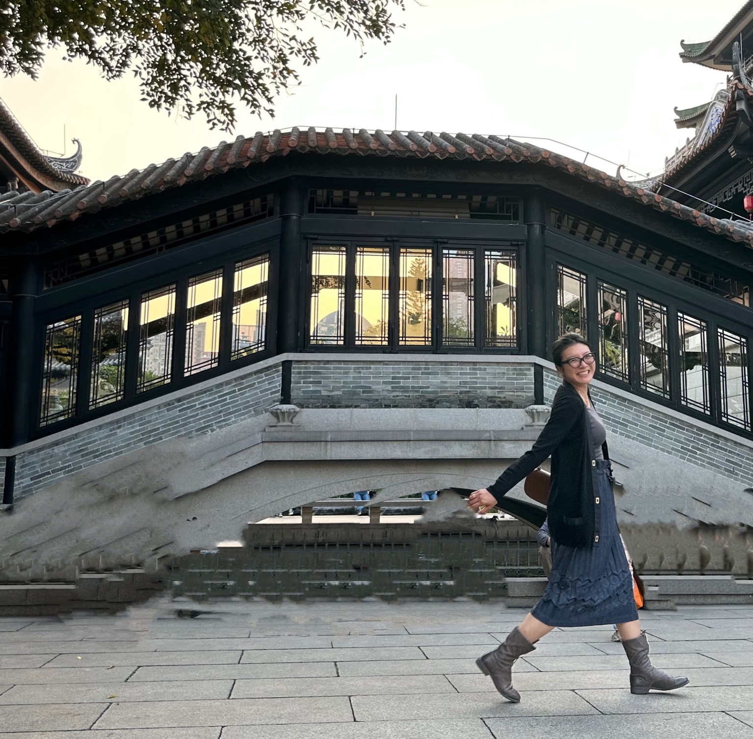 Miao Health founder Iris Wang in a traditional garden setting